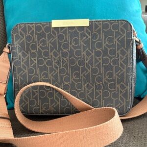 Calvin Klein Monogram Crossbody Bag in Brown/Tan